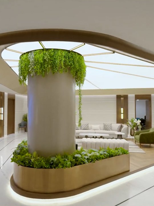 Curved white stretch ceiling in a luxury lounge with greenery — commercial and residential benefits